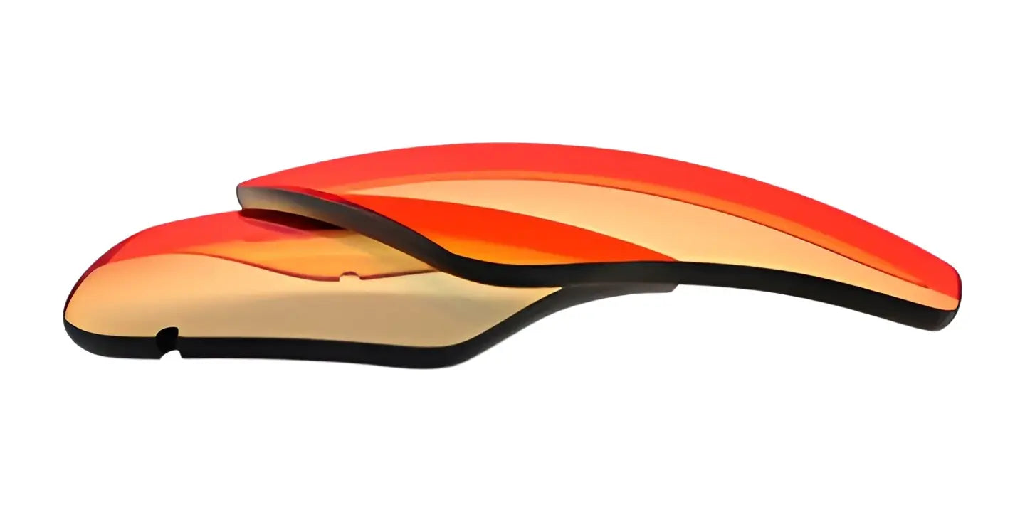 Two orange-tinted curved RE Ranger Edge Lenses are stacked on a white background, featuring RE Ranger's Claysight Lens Technology for exceptional clarity.