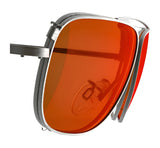 Close-up of RE Ranger Sporter Clip-On Lens, featuring orange-tinted RIACT A.I. lens and a sleek silver frame by RE Ranger, shown from a side angle on a white background.