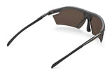 Rudy Project Rydon Sunglasses by Rudy Project with brown-tinted lenses and adjustable anti-slip nosepads, viewed from the back at an angle on a white background.