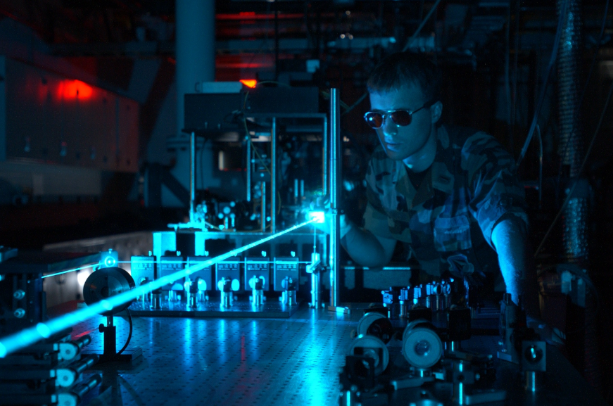 person working with lasers